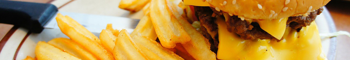 Eating Burger at Tams Burgers restaurant in Long Beach, CA.